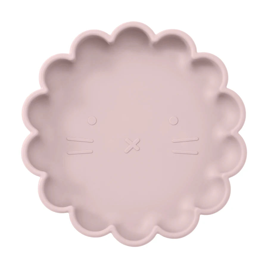 Présentation d'une assiette pour bébé en silicone rose clair.