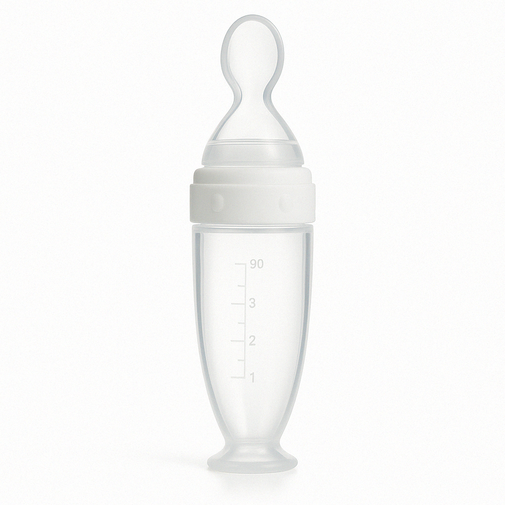 Présentation d'une cuillère doseuse pour bébé blanche.
